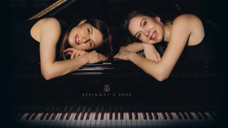 TWO PIANOS � ONE STORY